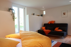 Comfy sofa in the Appartement Jaune Appartement Jaune